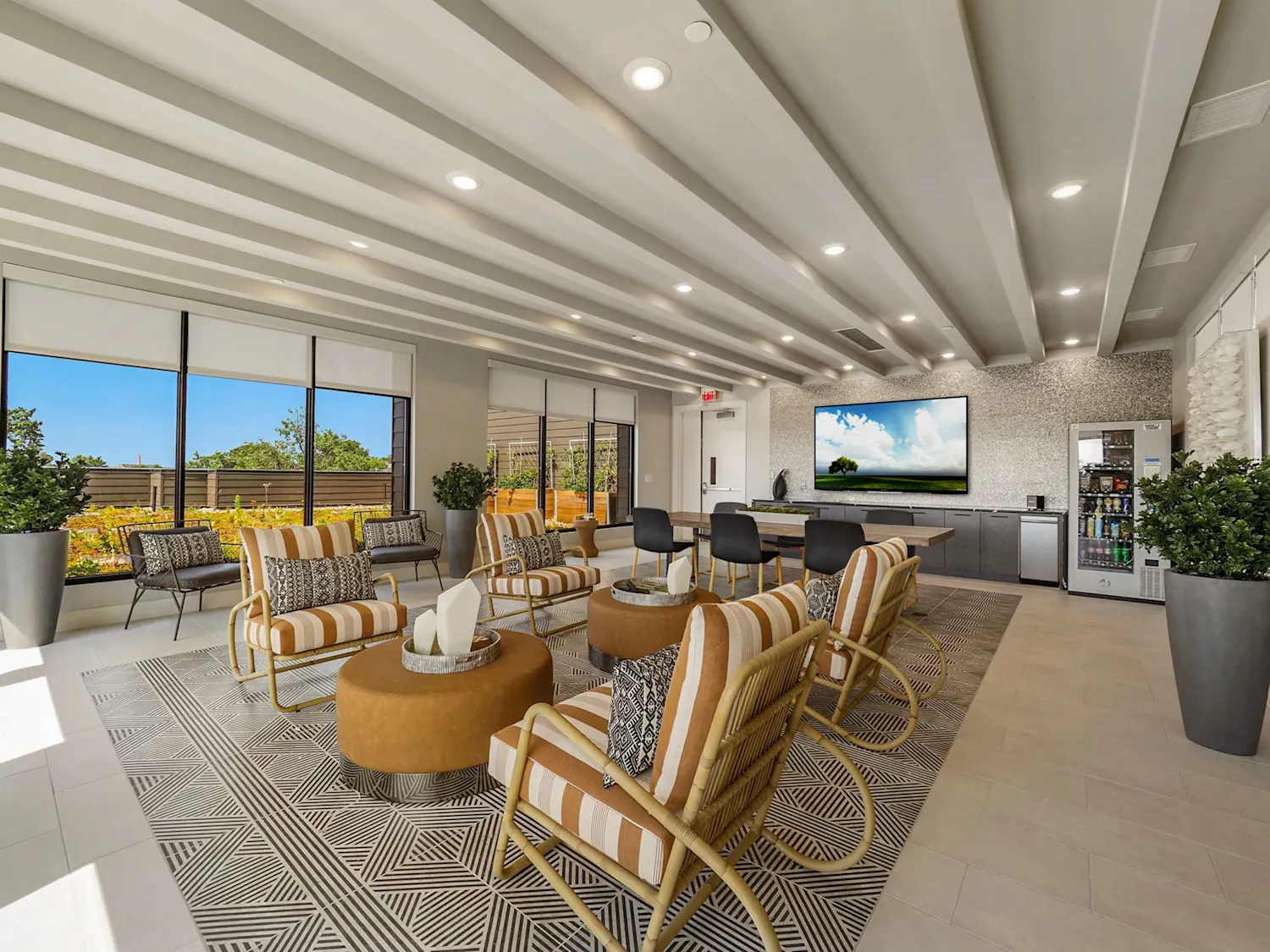 Club house seating area with counters, mini fridge and vending machine
